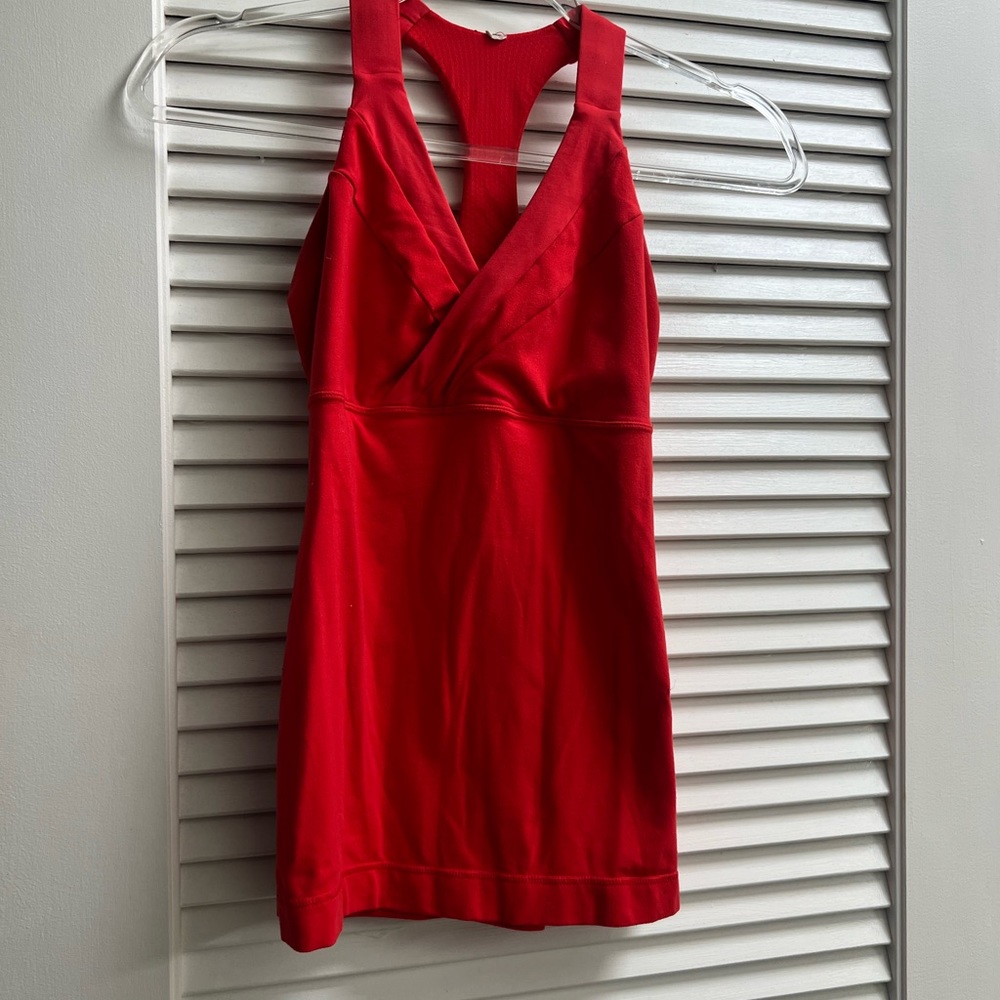 Lululemon workout shirt in red, size small.